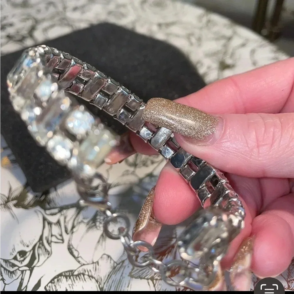 VINTAGE CLEAR STONE BAGUETTE SILVERTONE BANGLE WITH SECURITY CHAIN